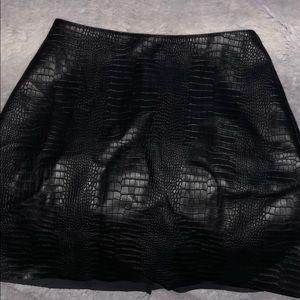 Faux snake skin leather skirt.